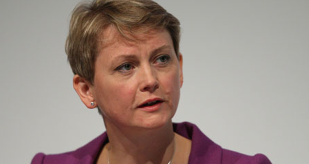 A photo of Yvette Cooper speaking to someone offscreen. She seems concerned.